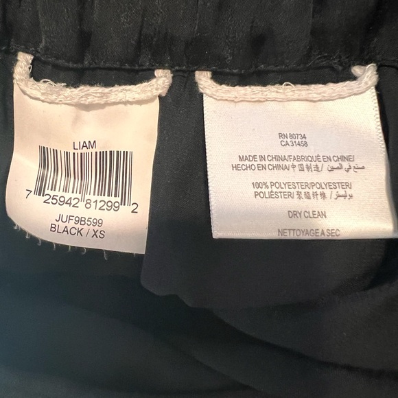 Sexy & Sophisticated BCBGMaxAzria Black Lace Detail Jumpsuit with Pockets - Picture 9 of 10